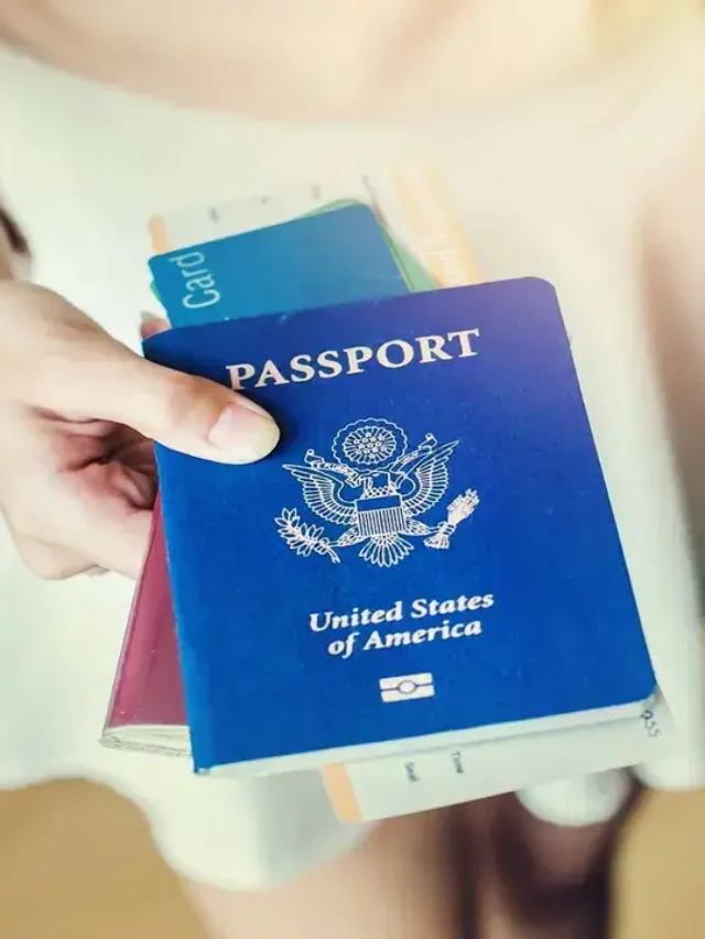 A passport and travel insurance documents.