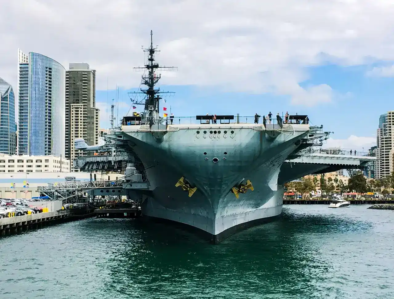 A view from a harbor cruise featuring the USS Midway Museum and Coronado